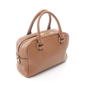 Prada Vitello Phenix Bauletto bag in caramel brown pebbled leather